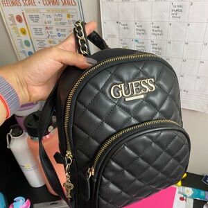 Black Guess back used in good condition